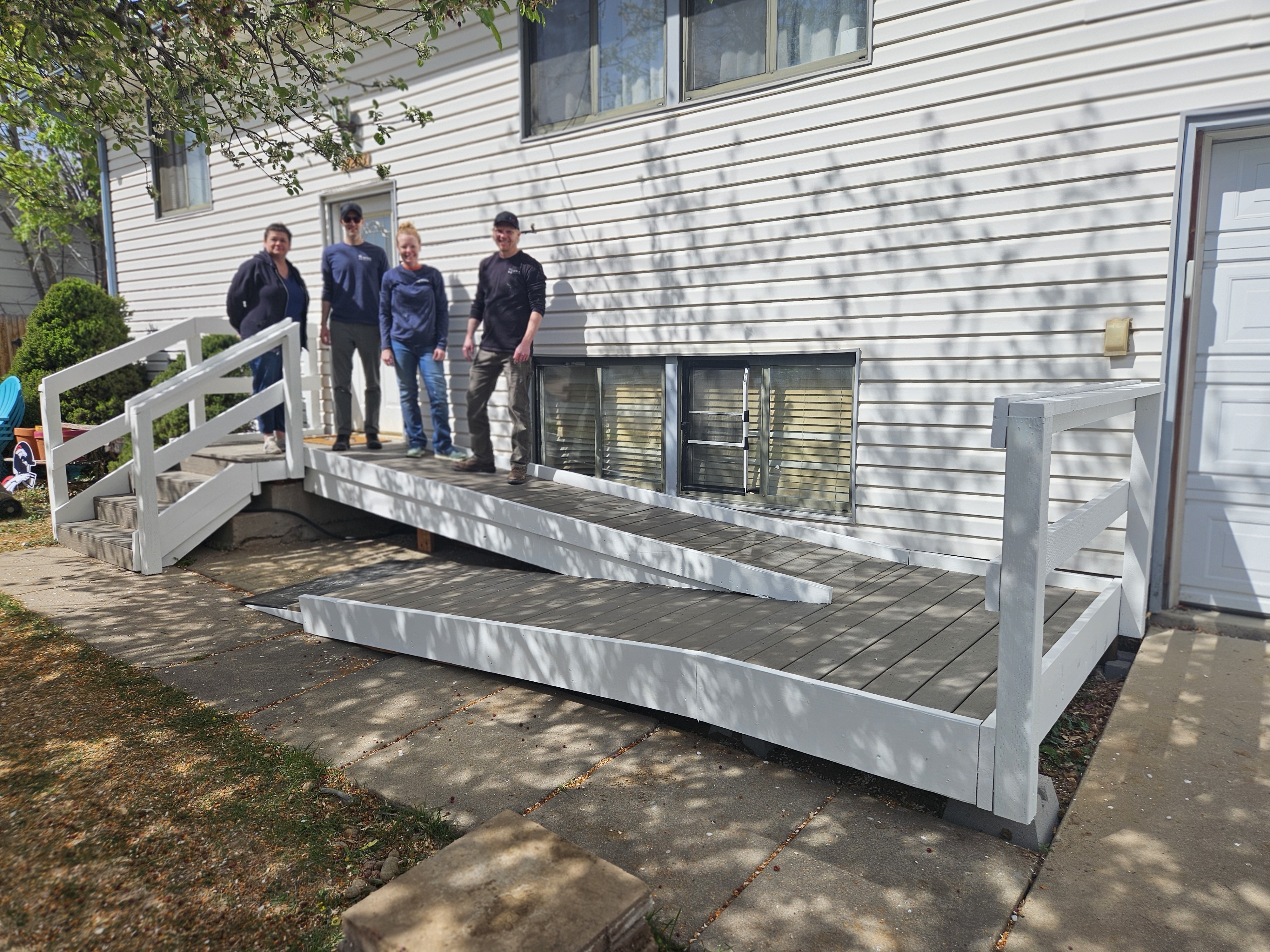 Fortress Framing team building a community deck